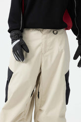 Pantalones de nieve holgados con bolsillos cargo y bloques de color beige para hombre